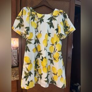 Boutique lemon print dress. Short puffy sleeves. Size M
